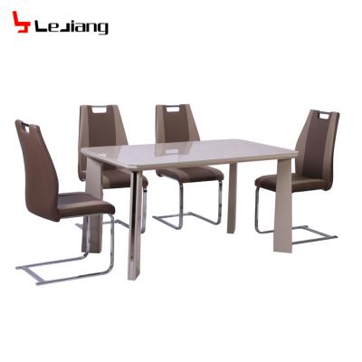 China Free Sample Luxury DINING TABLE Solid Wood Height Adjustable Chippendal Style Gold Glass Dining Table for sale