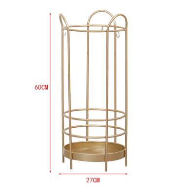 China Hot Modern Factory Turned Gold Metal Floor Storage Umbrella Rack For Fashion Store Supermarket Mall for sale