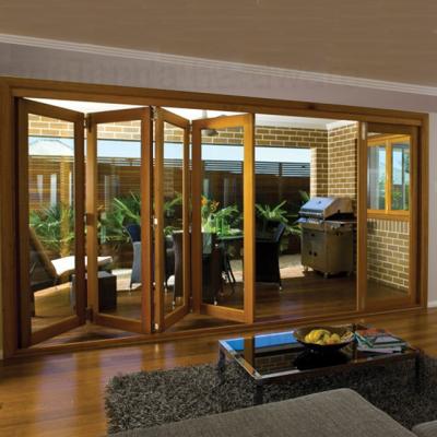 China Heat Insulation Wood Bifolding Aluminum Clad Double Glazed Folding Doors for sale