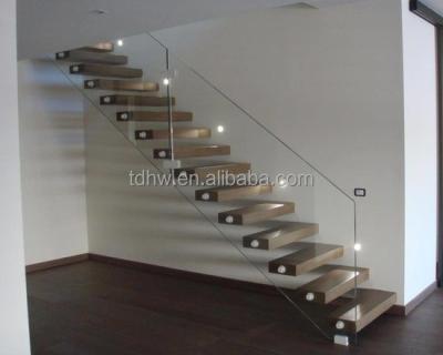 China Stainless Steel Wood Stair Frameless Glass Railings With Standoff Fitting for sale