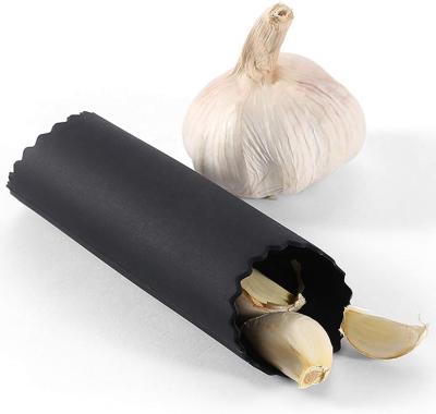 China Odorless Garlic Stored Easy Useful Tube Garlic Silicone Kitchen Tool Roller Peeler for sale