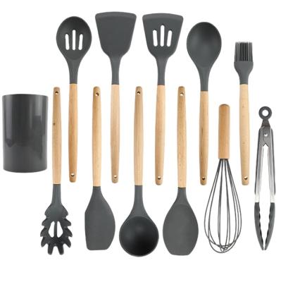 China Stocked 11pcs Silicone Cookware Set With Plug And Handle BPA Free Wooden Nonstick Cookware Heat Resistant Set for sale