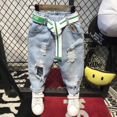 China 2022 fashion boys jeans children's breathable patchwork letter printing washed jeans boys jeans 3-14 year old for sale