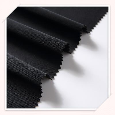 China Netting Sustainable Stock Polyester Fabric Solid Color Knitted Lightweight Super Poly Fabric For Clothing for sale