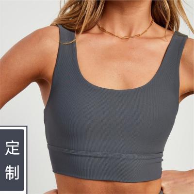 China 78%Nylon+22%Spandex Wholesale Ribbed Sports Bra Women Fitness Yoga Bra Side Covered High Impact Gathering for sale