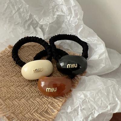 China Women Girls Hair Accessories New Retro Ponytail Holder Hair Ring Rope Minimalist Acrylic Pea Surfaced Elastic Hair Ties Hairband Letter Women Girls Hair Band for sale