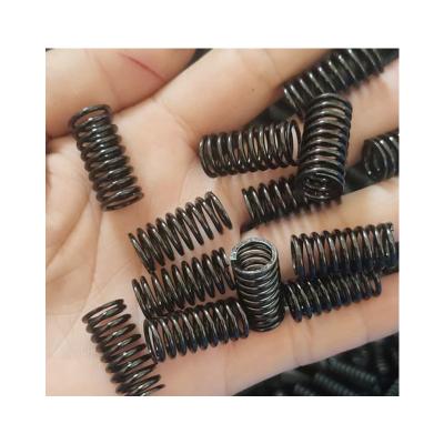 China Coil Carbon Steel Cable Coil Spring Black Coating Protective Coil Spring for sale