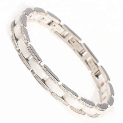 China Trendy CZ Stone Fashion Wollet Magnetic White Black Ceramic Bio Bracelet For Women Men for sale