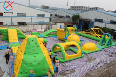 China Fabriek Reus 0,9 mm PVC opblaasbaar waterpark Drijvend waterpark Te koop