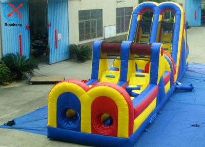 China Curso de obstáculos inflable inflable con toboganes en venta