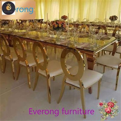 China Adjustable (other) designs glass metal legs stainless steel wedding coffee dining table set 6 chairs for sale