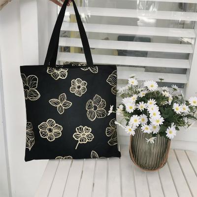 China New Designer Canvas Bags Large Capacity Shoulder Canvas Bag Eco-friendly Gold Flower Printed Shopping Cotton Bag for sale