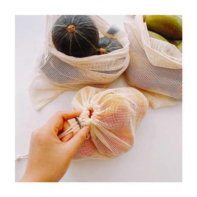 China 100% Hot Eco-friendly Sales Cotton Storage Organizer Bag Vegetable Fruit Mesh Drawstring Bag Strong Drawstring Mesh Bag for sale