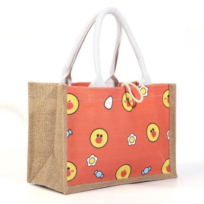 China 100% Hot Sales China Jute Cartoon Fruit Bear Printing Eco-friendly Customized Jute Bags With White Handle for sale