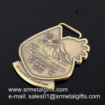 China Tailor made exclusive engraved metal medals wholesaler China factory for sale