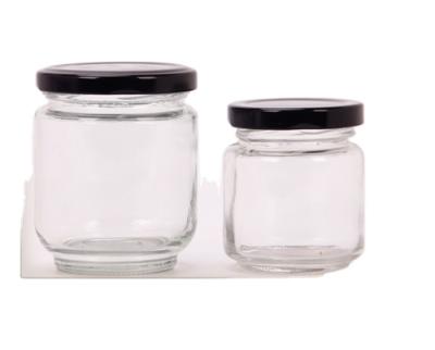 China Personal Food 250ml Glass Airtight Jar High Quality Clear Food Empty Round Honey Storage Glass Bottle Jars With Caps for sale