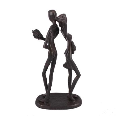 China Metal Metal Opens Couple Reading Books Bronze Sculptures For Wedding Gifts for sale