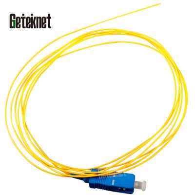 China FTTH 12 Bundle 9/125 Fiber Optic SC/UPC Fiber Optic Pigtail SM Fiber Simplex G657A 0.9mm Braid 1M Yellow 3FT Patch Cord for sale