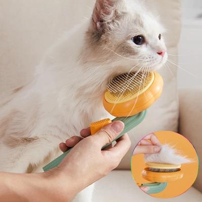 China Pet Viable Hair Removal Brush Dog Hair Removal Comb Pumpkin Pet Comb Brush Cat Automatic Cleaning Comb for sale