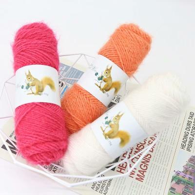 China 2021 Anti-bacteria Squirrel Down Yarn Hand Knitting Raw Yarn Velvet Yarn Hat Scarf Bright Silk Woolen Coat for sale