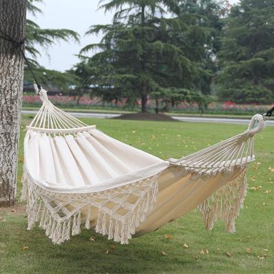 China Durable Special Hot Selling Outdoor White Color Tassel Canvas Hammock Garden Swing for sale