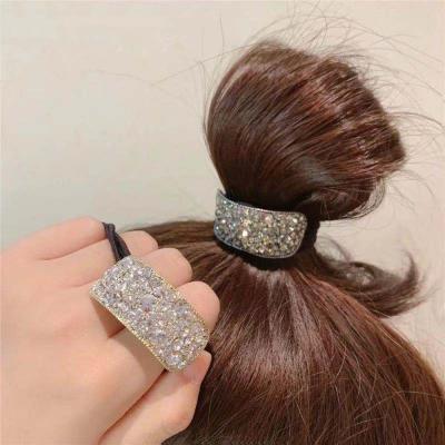 China Yiwu Popular Black Buckle Yiwu Rhinestone Elastic Hair Rings Hair Styling Ring for sale