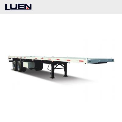 China Truck trailer 75 tons double tire 4 axles tail lights container lock used flatbed trailer for sale in Angola for sale