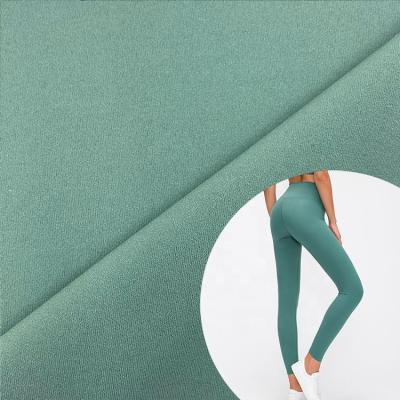 China Kinds of weft knitting polyester stretch fashionable wholesale high quality stock yoga wear spandex fabric for sale