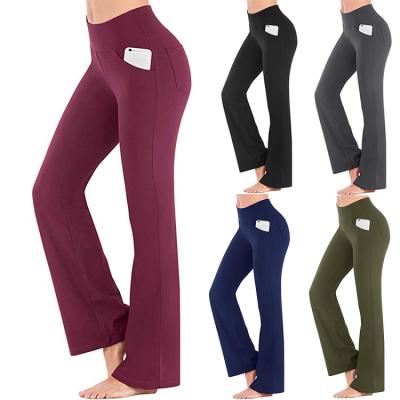 China Breathable Bootcut Yoga Pants With Pockets For Women High Waisted Yoga Gaiters Tummy Control Workout Loose Pants For Women Flared Pants for sale