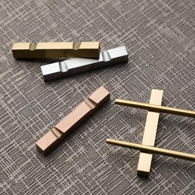 China Sliver or Gold Stainless Steel Chopstick Holder Sustainable Metal Chopstick Rest Sanding Polish for sale