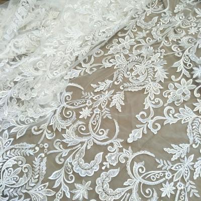 China 2023 new normal flower other wedding fabric new ivory white dress women's dress fabric with sequin width 130cm for sale