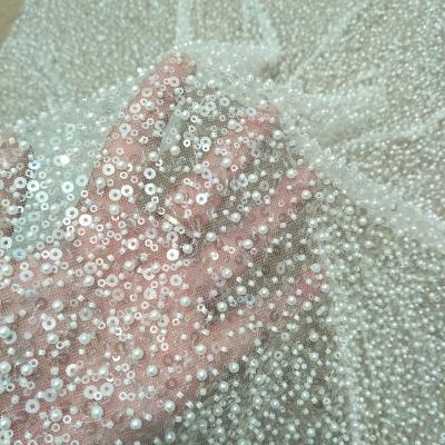 China Other Full Size Heavy Beaded Lace Fabric With Beads New Arrival Wedding Dress Lace Fabric Ivory Color Beading for sale