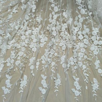 China Other New Arrival Small Flower Fashion Beaded Lace Fabric 130cm Width Dress Lace Fabric Sale By The Yard for sale