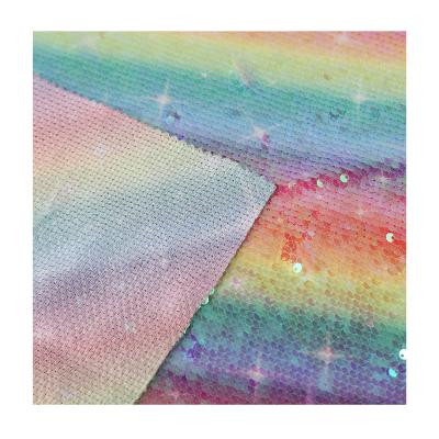 China Shrink-Resistant Graduated Colorful Shiny Sequin Embroidery Rainbow Decorative Fabric, Wholesale Fish Scale Sequin Fabric for sale