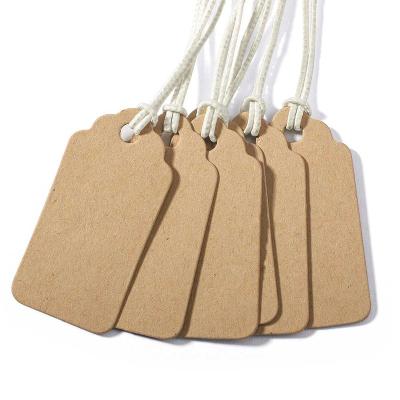 China Sustainable Custom Wedding Brown Paper Gift Wrapping Birthday Gift Programmable Present Tags for sale