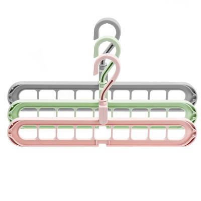 China 9 Hole Space Saving Hanger Cabinet Plastic Organizer Perchas Organizadoras Colgador Magico Para Ropa for sale