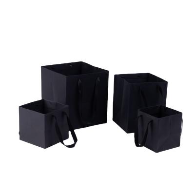 China High Quality Recycled Materials Black Square Gift Paper Bag Large Side Width Tote Bag for sale