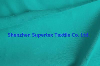 Chine Le jacquard uniforme de tissu de sergé du polyester DTY de tissu de vêtements de travail marque avec des lettres la couleur verte de tissu de deux tons à vendre