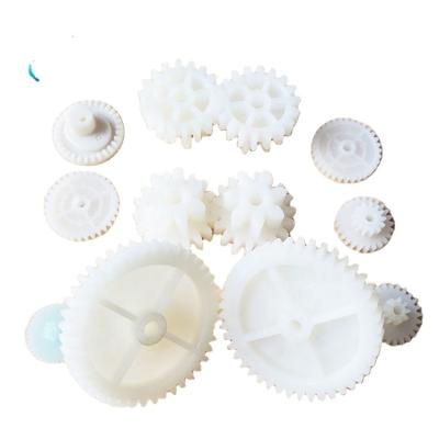 China Manufacturing Equipment OEM Design Plastic Parts Latest Injection Molding White Molding Gears / Custom Plastic Injection Molding Gear Part for sale