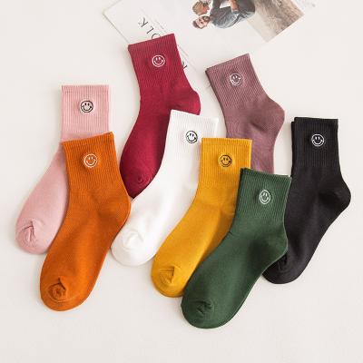 China Sporty Colorful Smiling Face Cotton Women Crew Embroidery Tube Crew Embroidery Ribbed Socks for sale