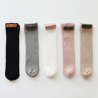 China Non-slip Fashion Simple Style Ribbed Kids Girl Socks Over The Knee With Bowknot Baby Socks Cute Knee High for sale