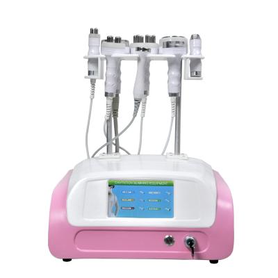 China Skin Tightening 8 in 1 Cavitation Vacuum Slimming Machine RF Body Slimming Beauty Ultrasonic Device for sale