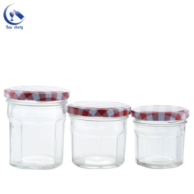 China YOUCHENG 90ml 130ml 500ml round shape honey jam glass jar with metal lid for sale