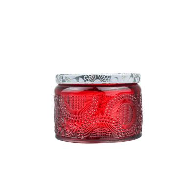 China Wholesale 120ml 250ml 500ml style candle jar red transparent embossed glass candle holder with lid for sale