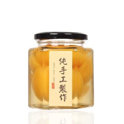 China Youcheng 45~730ml Empty Glass Clear Hexagon Shaped Glass Honey Jam Jar With Metal Lid for sale