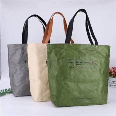 China Custom Handled Customized Waterproof Tyvek Shopping Tote Bags Washable Paper Bag Handle Tyvek Leather Bag With Rivet for sale