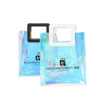 China Hot Selling PVC Beach Holographic Tote Bag Waterproof Transparent Clear Plastic Handled Gift Bag With Handle For Gift Packing for sale