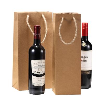 China Recyclable Custom Logo Printed Wine Bag Gift Bottles Brown Packaging Paper Bag Packaging Shopping Bags OEM Recyclable for sale