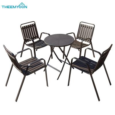 China Weather Resistant Waterproof Folding Outdoor Round Table And Chair 4 Seater Patio Backyard Garden Garden Sets for sale