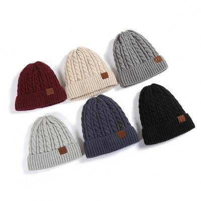 China Men COMMON Outdoor Winter Fashion Woolen Warm Hats Knitted Beanie Hat Pom Pom Beanie for sale